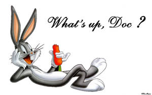 賓尼兔拿著胡蘿蔔，微笑並帶有文字 What's up Doc? — 兔巴哥 壁紙