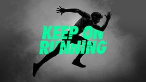 跑者剪影與綠色文字 keep on running。