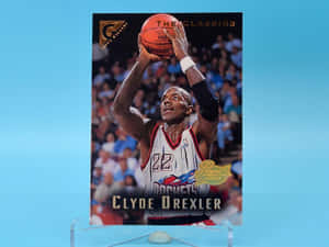 Clyde Drexler身穿火箭隊球衣投籃。 — 運動 壁紙