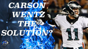 身穿 Eagles 球衣的足球運動員 Carson Wentz 被藍色火焰包圍，文字詢問他是否解決方案。 — 美式足球 壁紙