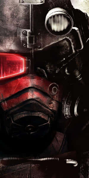 在黑暗的反烏托邦環境中，一個破舊的防毒面具特寫，帶有發光的紅色眼睛。 — Pixel 3 壁紙
