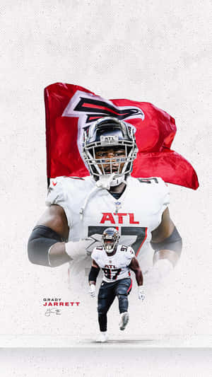 身穿獵鷹隊球衣的足球運動員 Grady Jarrett 身後飄揚著隊旗奔跑。 — 美式足球 壁紙
