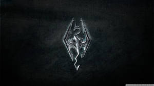 深色皮革背景上的銀色Skyrim龍紋章 — 上古卷軸V：無界天際 壁紙