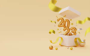 金色2023數字從一個帶有黃色絲帶和裝飾的白色禮物盒中出現。 — 聖誕球 壁紙