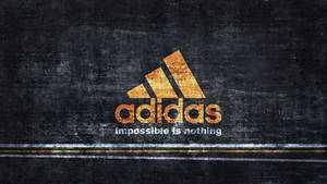 Adidas標誌，帶有口號impossible is nothing，在深色紋理背景上。 — 品牌 壁紙