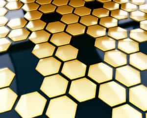 金色六角形瓷磚以幾何圖案排列，具有反光表面和深色陰影。 — 暗黑美學電腦 壁紙