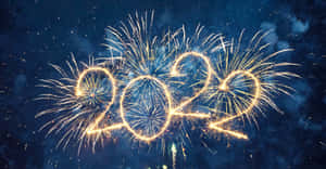 煙火在夜空中形成2022年。 — 新年快樂 2020 壁紙