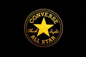 黑色背景上的金色Converse All Star標誌 — 省電 壁紙