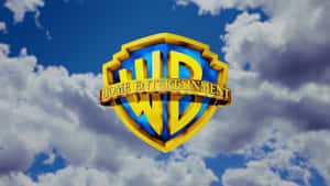 Warner Bros Home Entertainment標誌在多雲的藍天上。 — 洛杉磯日落 壁紙