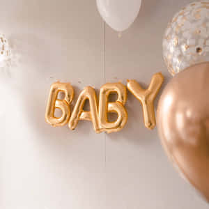 金色 BABY 氣球和玫瑰金五彩紙屑氣球，用於嬰兒送禮會慶祝。 — 小寶貝 壁紙