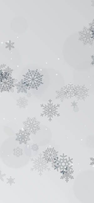 銀色雪花在灰色背景上伴隨散景燈光飄落。 — iPhone 17 Pro 壁紙