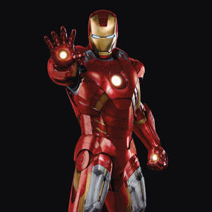 鋼鐵人穿著紅色和金色戰衣，發光的斥力炮向前伸出。 — 鋼鐵人標誌 壁紙