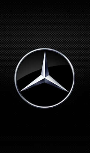 碳纖維背景上的Mercedes-Benz標誌 — 海灘 壁紙