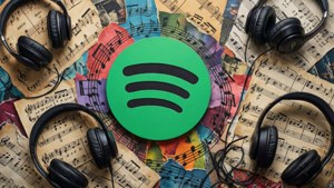 Spotify標誌被耳機和彩色樂譜環繞。 — Spotify 壁紙