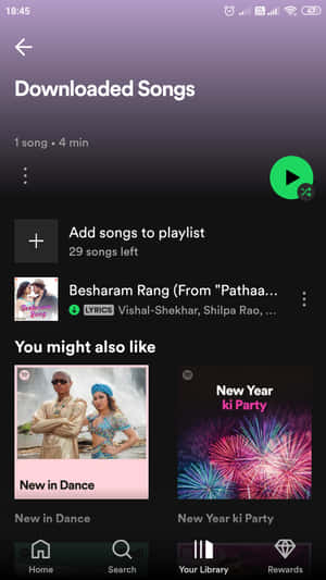 顯示已下載歌曲和播放清單建議的行動音樂應用程式。 — Spotify 壁紙