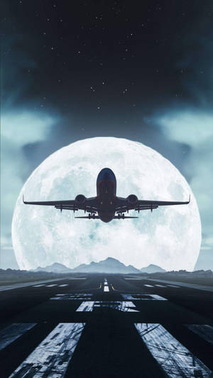 飛機在夜間起飛，在巨大的月亮下 — 伸展台 壁紙