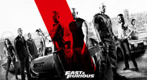 Fast and Furious 演員陣容與肌肉車在黎明時分的城市街道上。 — 玩命關頭 壁紙