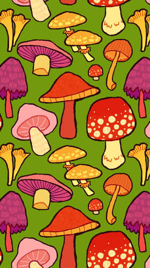 各種形狀和大小的彩色卡通蘑菇在綠色背景上。 — 蘑菇美學 壁紙