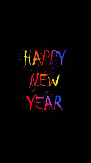 黑色背景上以彩色油漆潑濺呈現的Happy New Year文字 — 慶祝 壁紙