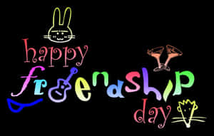 Happy Friendship Day 文字，以彩虹霓虹字母和有趣圖標呈現於黑色背景上。 — 省電 壁紙