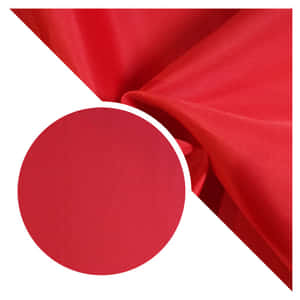 紅色布料特寫，白色背景上有一個圓形色板。 — 純紅色 壁紙