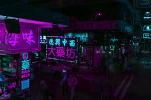 夜間霓虹燈照亮的香港街道，有發光的招牌和行人。 — 霓虹紫 壁紙