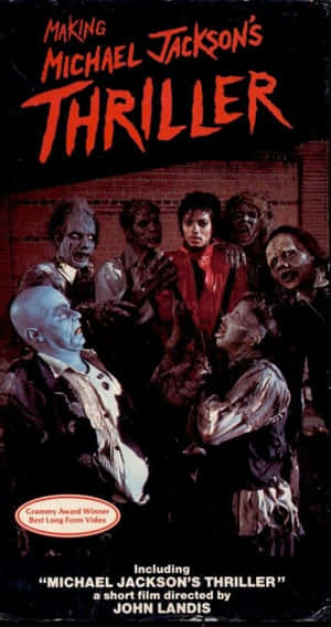 麥可傑克森與殭屍舞者出現在《Thriller》的VHS封面上。 — 麥可·傑克森 GIF 壁紙