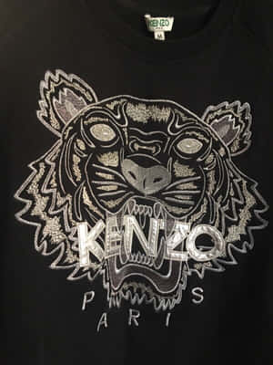 黑色 Kenzo 連帽衫，帶有銀色刺繡老虎頭標誌。 — 老虎伍茲 壁紙