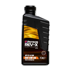黑色Petron Rev-X柴油引擎機油瓶，帶金色標籤。 — 引擎油 壁紙