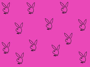 粉紅色背景上散落著黑色Playboy兔子標誌。 — 花花公子 GIF 壁紙