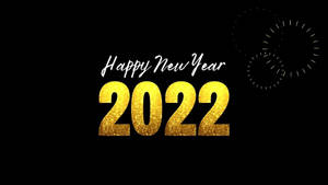黑色背景上金色閃亮的煙火和「Happy New Year 2022」。 — 新年快樂 2020 壁紙