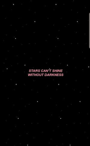 星空夜空中粉紅色文字寫著星星不能沒有黑暗而閃耀。 — Galaxy Tab S9 FE 壁紙
