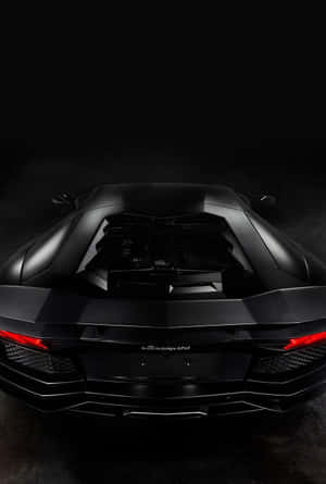 黑色藍寶堅尼Aventador在黑暗攝影棚中帶有紅色尾燈。 — 汽車 壁紙