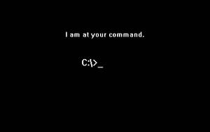 黑色螢幕帶有白色像素化文字「I am at your command.」和「C:>_」。 — 4K程式壁紙